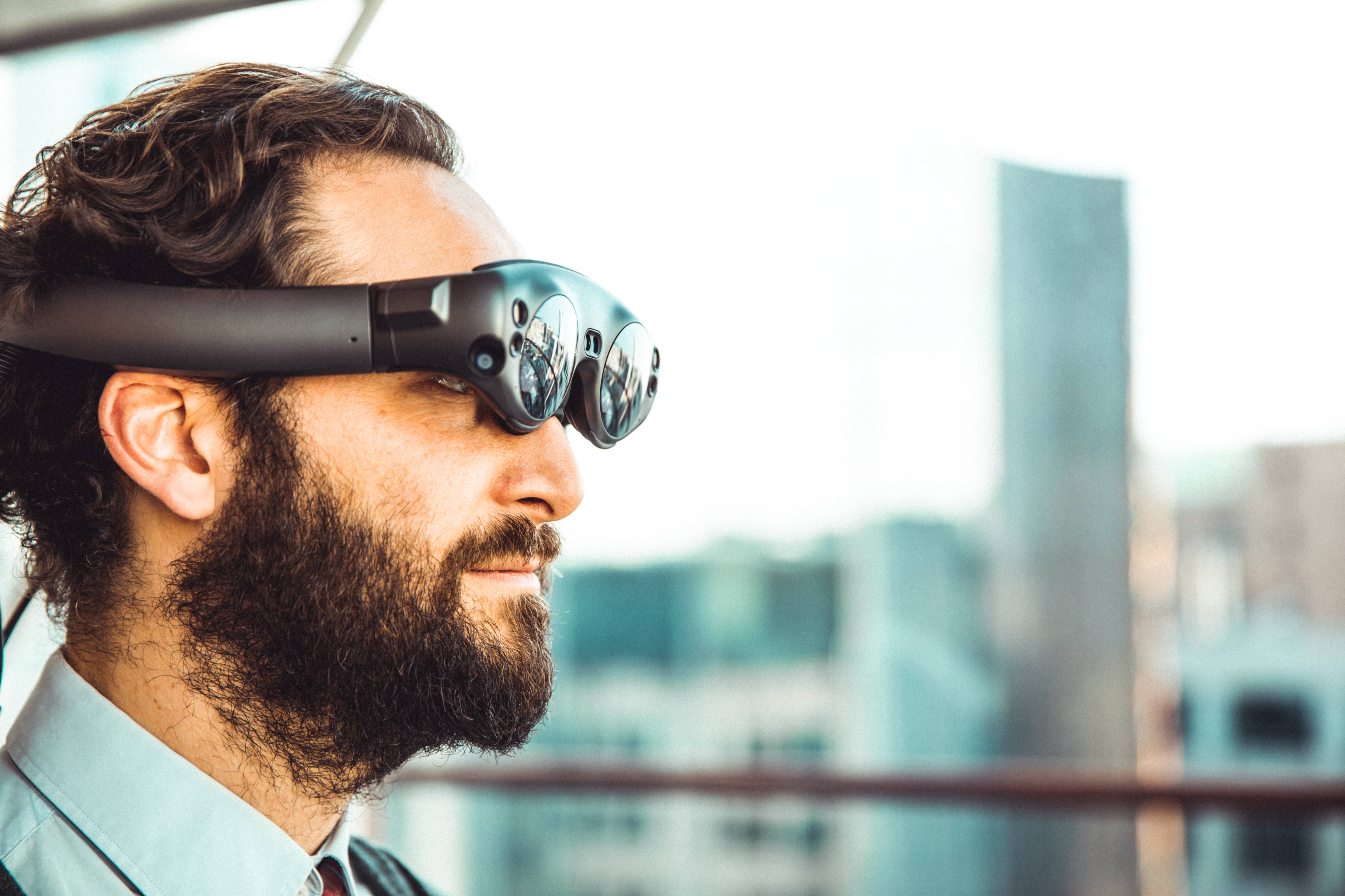 Image of a man wearing AR glasses